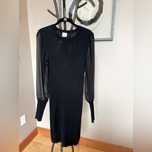 CAbi, M, fitted polyester/nylon dress with sheer sleeves.